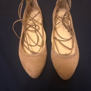 Tan suede Jessica Simpson lace up flats.